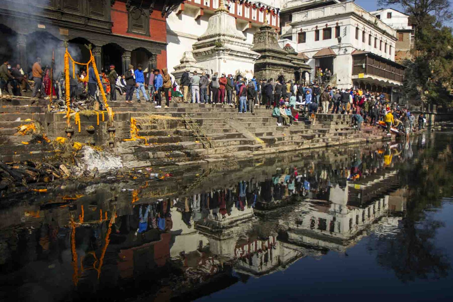 Temples at Pashupatinath are reflected in the Bagmati River